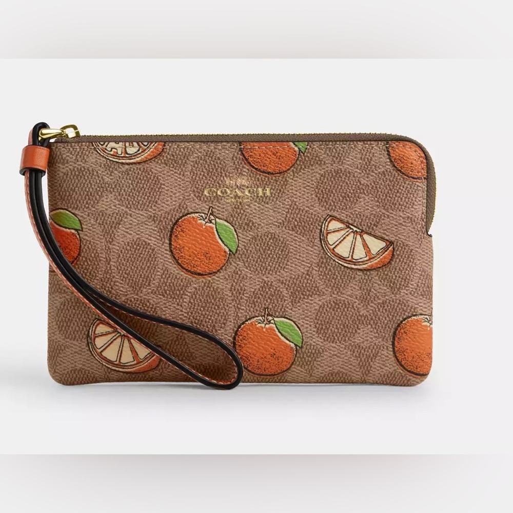New Corner Zip Wristlet In Signature Canvas